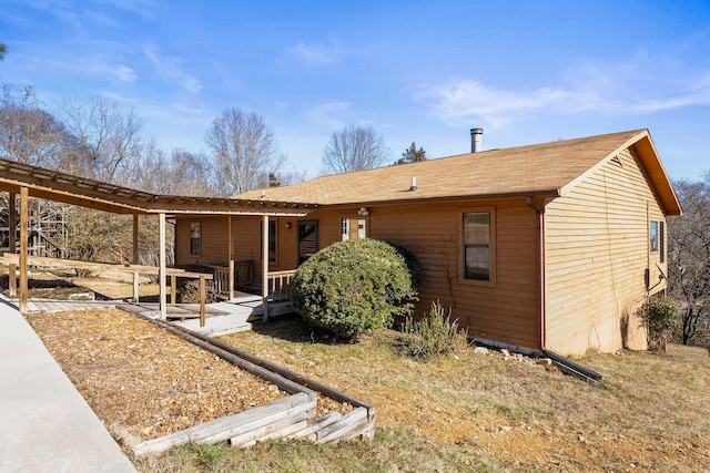 back of property with a patio area