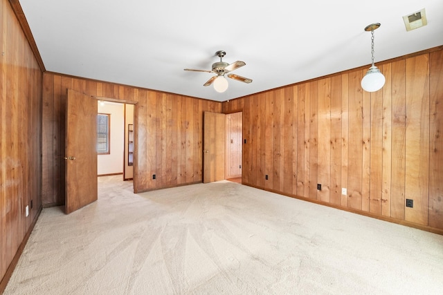 carpeted empty room with ceiling fan