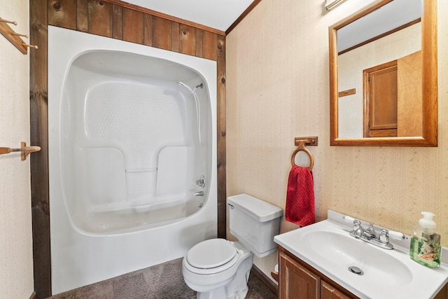 full bathroom with crown molding, vanity, toilet, and shower / washtub combination