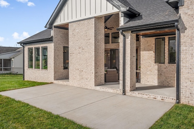 exterior space with a patio and ceiling fan