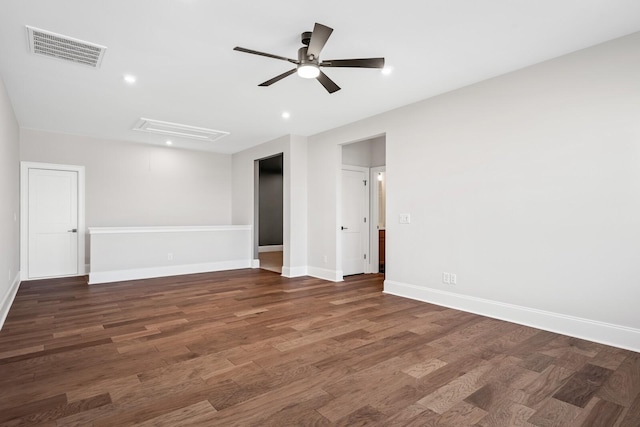 unfurnished room featuring dark hardwood / wood-style flooring and ceiling fan