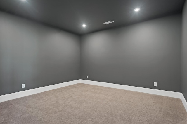 empty room with carpet flooring