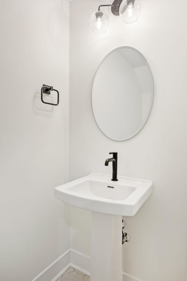 bathroom featuring sink and tile patterned floors