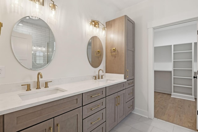 bathroom featuring tile patterned floors and vanity