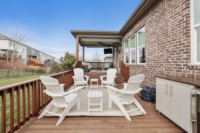 wooden terrace with ceiling fan