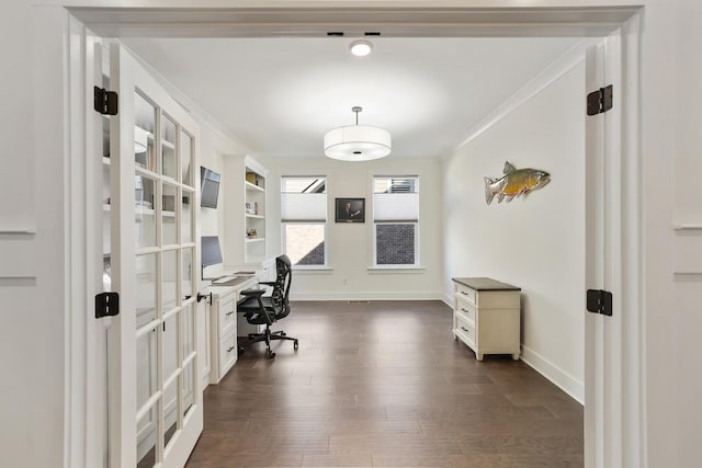 office space with dark wood-type flooring and ornamental molding