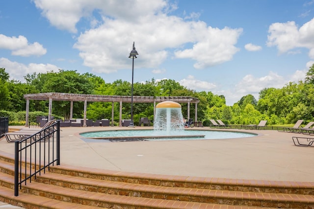 view of property's community with a patio area