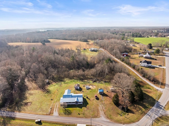 birds eye view of property featuring a rural view