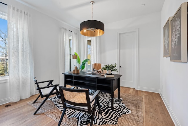 home office featuring light wood-type flooring