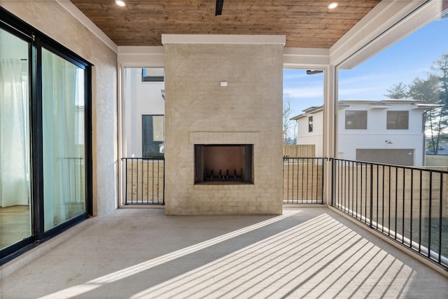 balcony with exterior fireplace