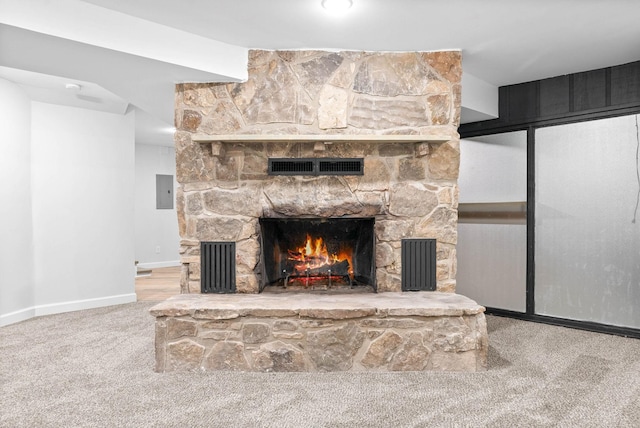 living room with carpet, electric panel, and a fireplace