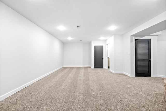 basement featuring carpet flooring
