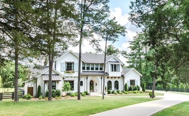 view of front of home with a front yard