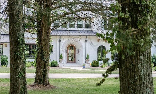 exterior space with a front yard