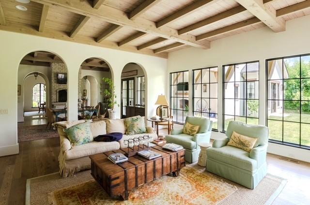 sunroom / solarium featuring beam ceiling and wood ceiling