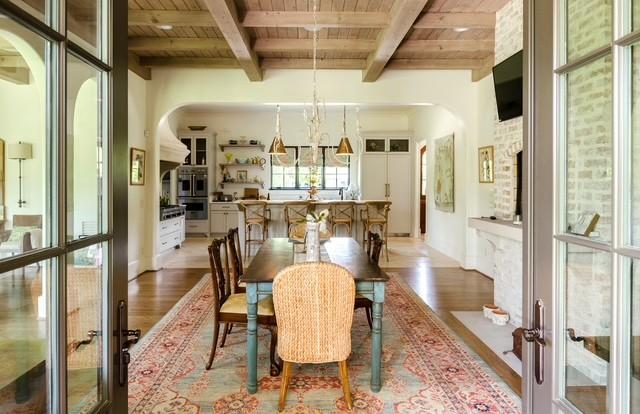 dining room featuring hardwood / wood-style flooring, french doors, beam ceiling, and wood ceiling