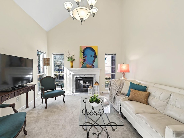 living room featuring carpet floors, high vaulted ceiling, a premium fireplace, and a healthy amount of sunlight