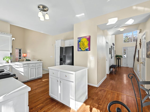 kitchen with white cabinetry, dishwasher, a center island, dark wood-type flooring, and black refrigerator with ice dispenser