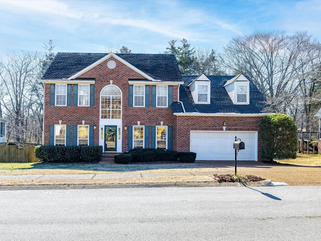 colonial-style house with a garage