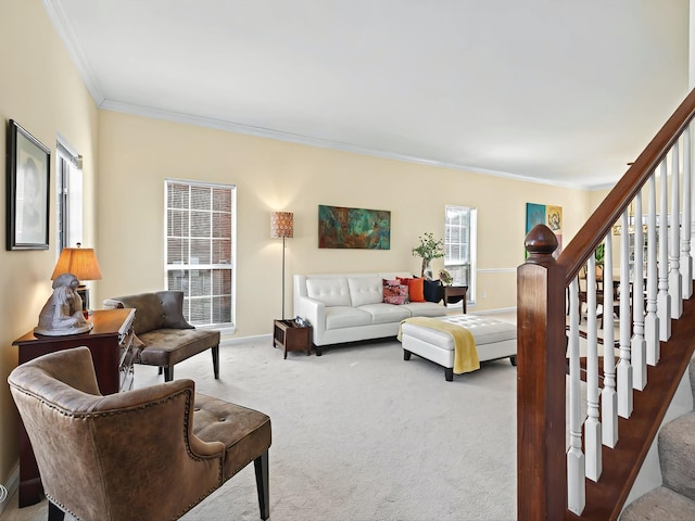 carpeted living room featuring ornamental molding