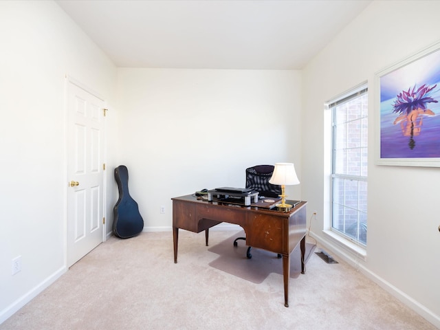 home office with light colored carpet