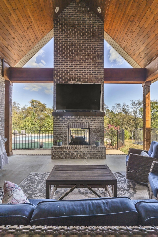 view of patio / terrace featuring an outdoor living space with a fireplace