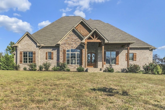 craftsman inspired home with a front yard