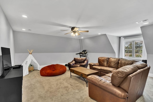 living room featuring lofted ceiling, light carpet, and ceiling fan