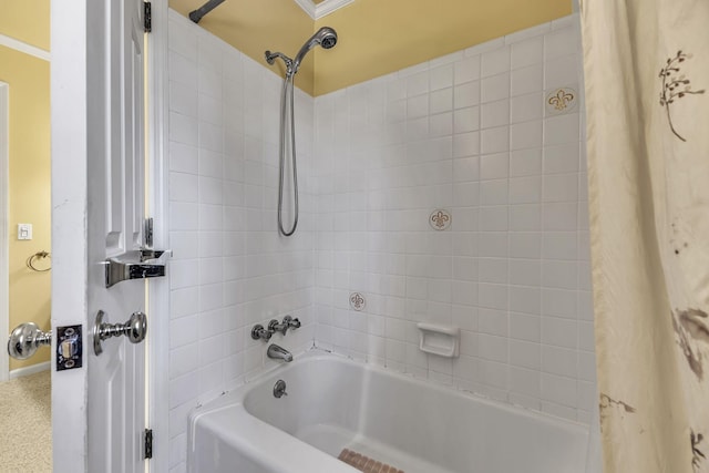 bathroom featuring shower / tub combo with curtain and ornamental molding