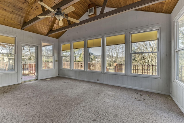 unfurnished sunroom featuring ceiling fan, wooden ceiling, and vaulted ceiling with beams