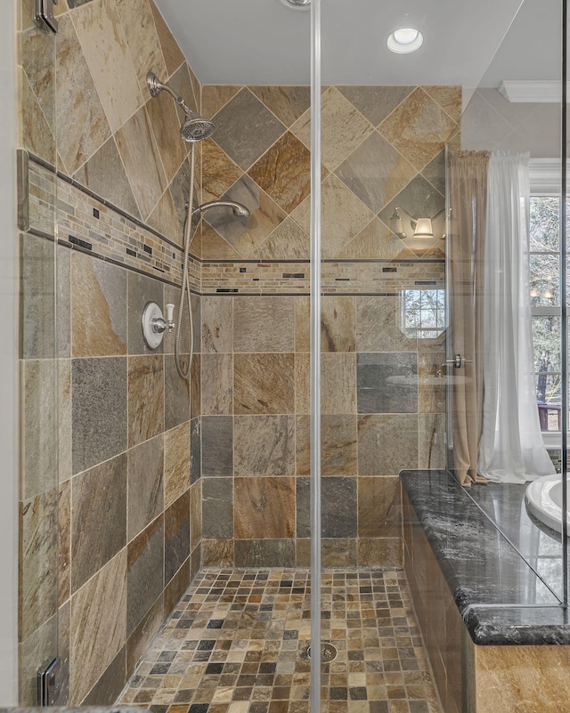 bathroom featuring an enclosed shower