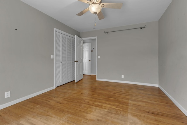 spare room with ceiling fan and light hardwood / wood-style flooring