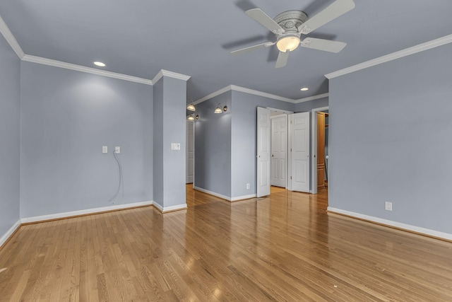 spare room with crown molding, ceiling fan, and light hardwood / wood-style floors