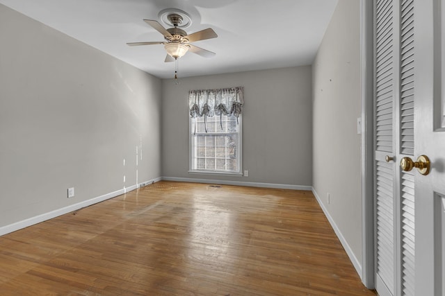 unfurnished bedroom with wood-type flooring and ceiling fan