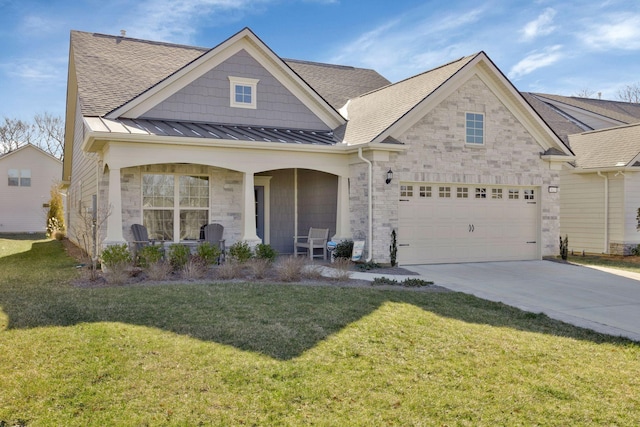 view of front facade with covered porch and a front lawn