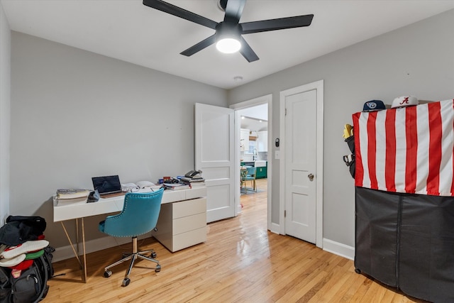 office area featuring ceiling fan and light hardwood / wood-style floors