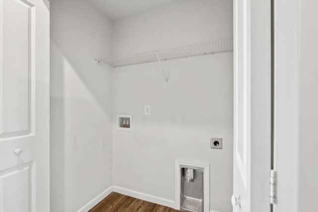 clothes washing area with washer hookup, dark wood-type flooring, and hookup for an electric dryer