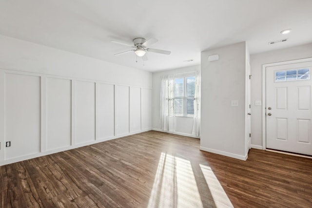 entryway featuring dark wood-type flooring and ceiling fan