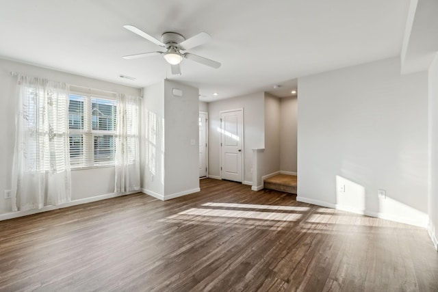 empty room with hardwood / wood-style flooring and ceiling fan