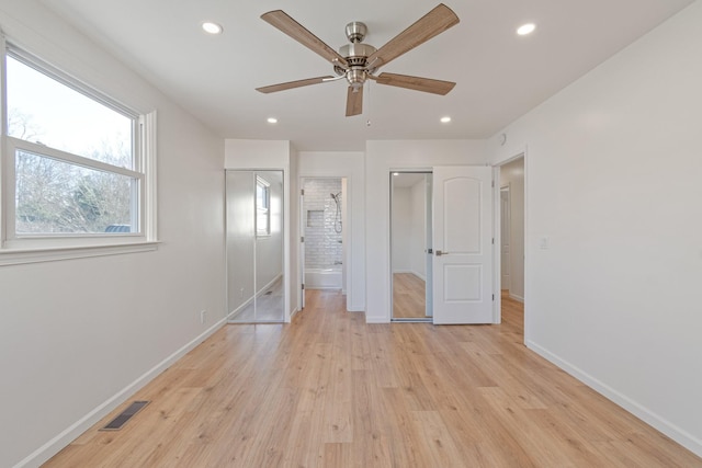 unfurnished bedroom featuring light hardwood / wood-style floors and ceiling fan