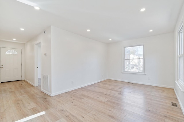 foyer with light hardwood / wood-style flooring