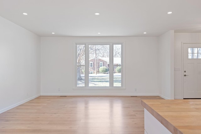 foyer with light hardwood / wood-style flooring