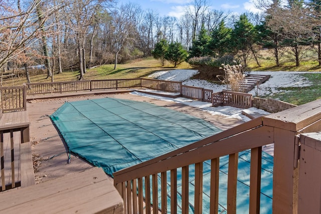 view of pool with a deck