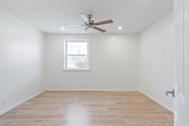 empty room featuring light hardwood / wood-style floors and ceiling fan