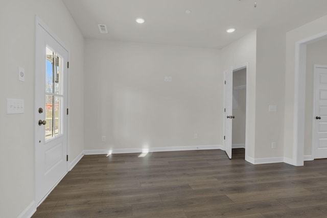 interior space featuring dark wood-type flooring