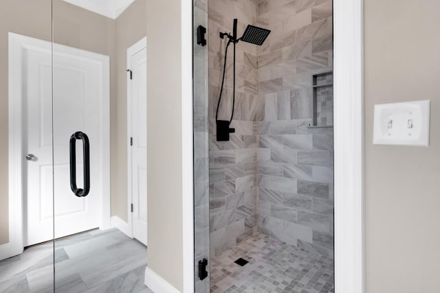 bathroom featuring an enclosed shower