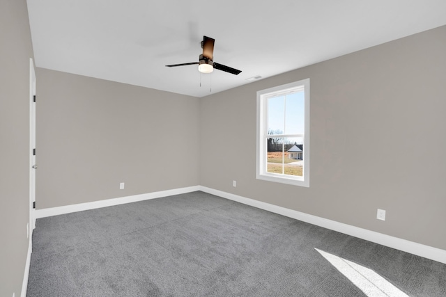 carpeted empty room with ceiling fan