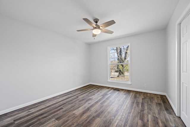 unfurnished bedroom with dark hardwood / wood-style flooring and ceiling fan