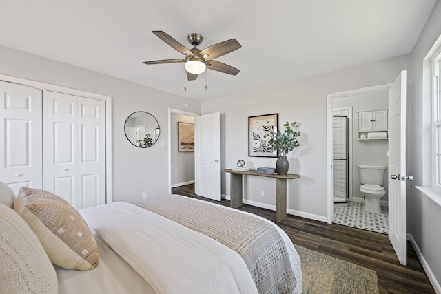 bedroom featuring dark hardwood / wood-style floors, ensuite bath, a closet, and ceiling fan