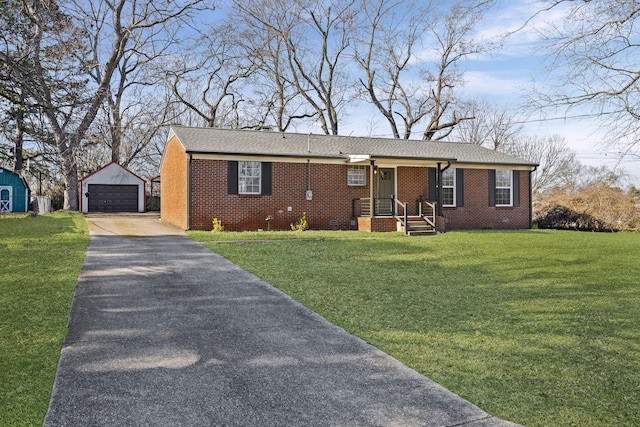 single story home featuring a garage, an outdoor structure, and a front yard